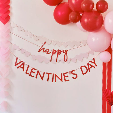 Festive red and pink bunting with 'Happy Valentine's Day' and heart designs, crafted from eco-friendly materials.