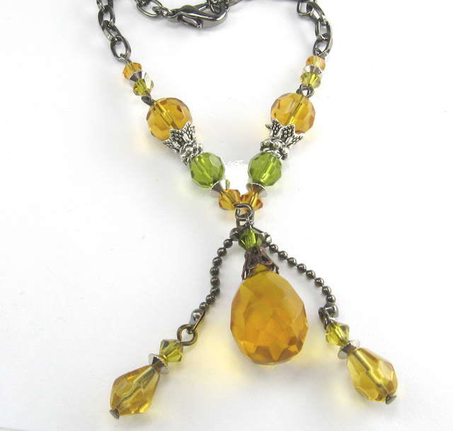 Vibrant yellow bead and crystal bracelet, handcrafted for elegance and adjustable for a perfect fit.