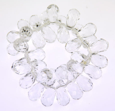 Clear stretch bracelet featuring elegant beads, ideal for layering or solo wear, perfect for any occasion.