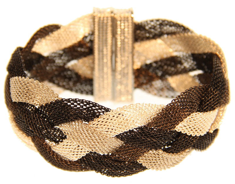 Elegant 3 Tone Plaited Bracelet featuring a unique design, perfect for enhancing any outfit's style and sophistication.