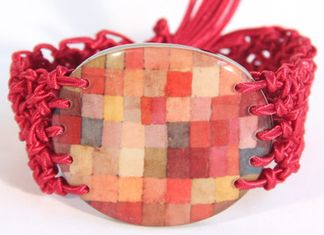 Bold red checkered resin bracelet from Smartfox NZ, adding a vibrant touch to any outfit.