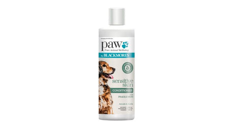 PAW Sensitive Conditioner for Dogs (500ml) features a hypoallergenic formula for fragile skin, enriched with rosemary and sandalwood oils.