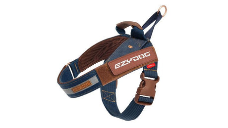 Stylish denim dog harness with leather patches, ergonomic padding, and reflective trim for safety and comfort.