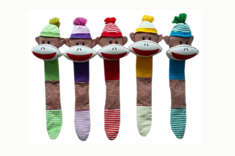 A durable sock monkey dog toy with a squeaker, perfect for active play, tug-of-war, and fetch for small to medium breeds.