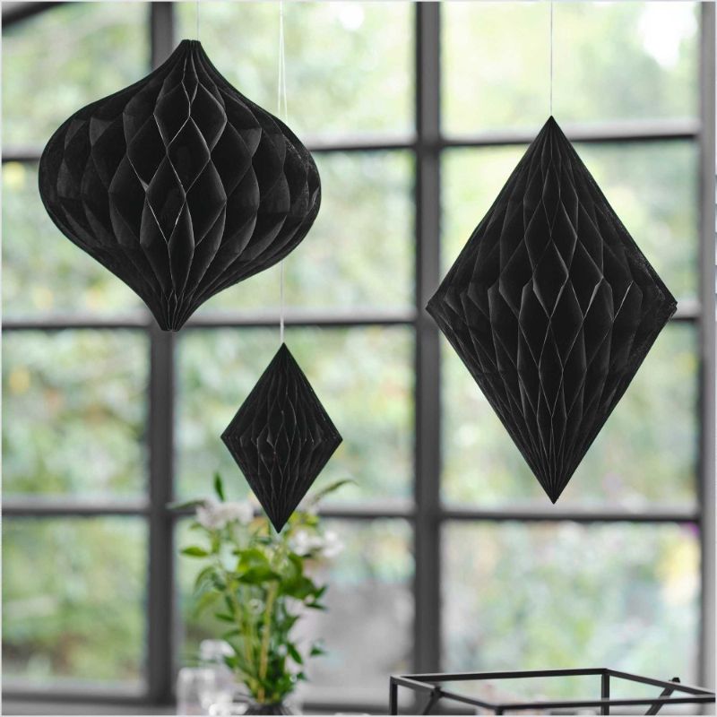 Contemporary black honeycomb wedding decorations, three sizes for elegant hanging decor at receptions and parties.