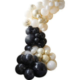 Elegant balloon arch in black, nude, and champagne gold for parties; includes 70 assorted balloons and assembly supplies.