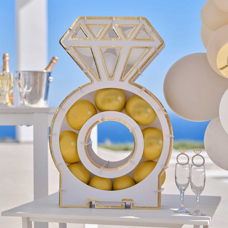 Engagement Ring Balloon Mosaic Stand features 10 white and 20 gold balloons, perfect for proposals or engagement celebrations.