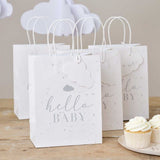 Adorable speckle and cloud baby shower gift bags, eco-friendly, with personalized name tags, perfect for any celebration.