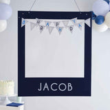 Customizable blue birthday photobooth frame with bunting and sticker sheets for memorable party photos.