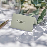 Sage green wedding place cards pack of 12, elegant design for guest seating at weddings, measuring 5x8 cm when folded.