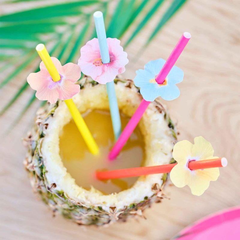 Colorful Hawaiian paper party straws with flower toppers, perfect for tropical-themed gatherings and eco-friendly celebrations.