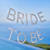 Silver "Bride To Be" bunting, 1.5m long with 2 stylish strands, perfect for hen parties and bridal celebrations.