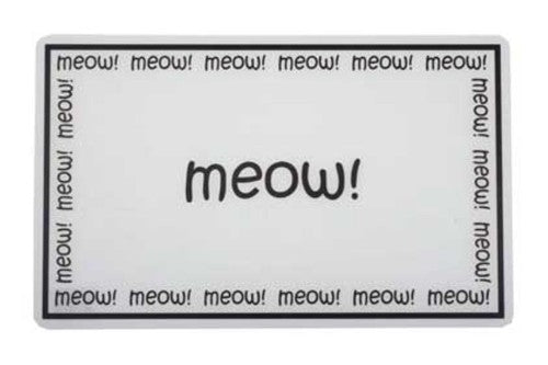 Stylish cat feed mat, 48cm x 30cm, non-slip, easy to clean, with adorable graphics for a tidy feeding area.