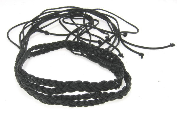 Thin plaited black belt, 155cm long with tassels, perfect for enhancing any outfit with style and sophistication.