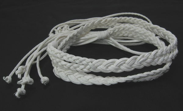 Thin white plaited belt, designed for elegance and versatility, perfect for any outfit and comfortably adjustable.