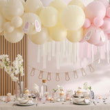 Pastel 'Happy Easter' balloons with polka dots, perfect for festive celebrations and eco-friendly packaging.