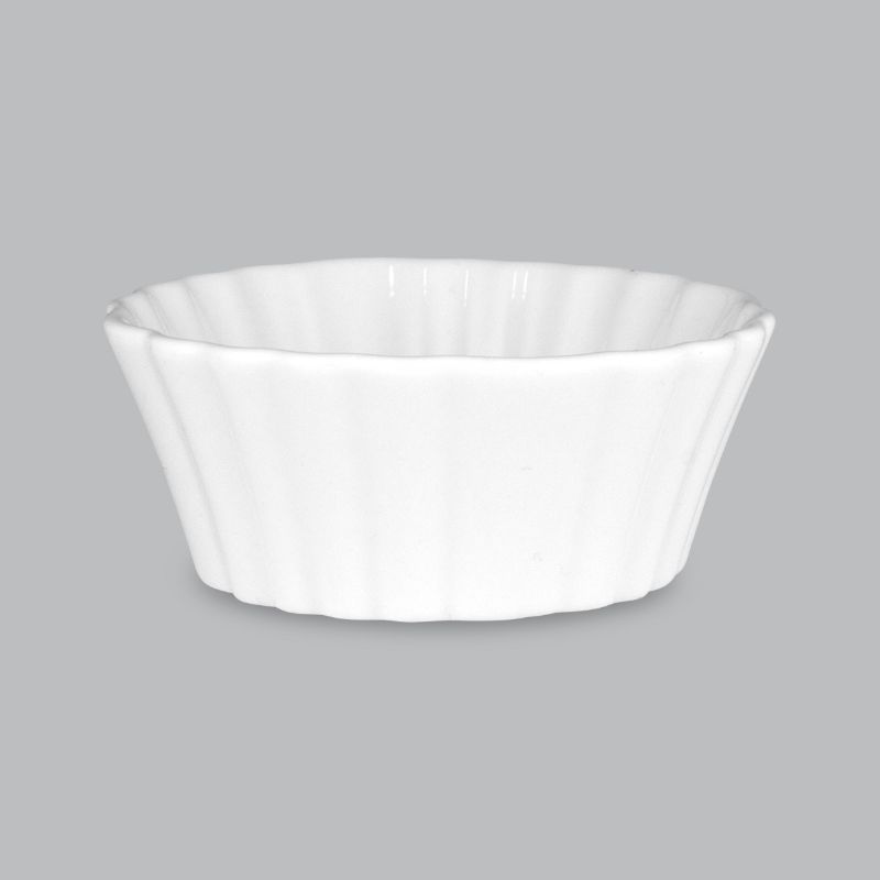 Elegant fluted flan dish in pristine white new bone porcelain, 100ml, safe for oven, microwave, freezer, and dishwasher.