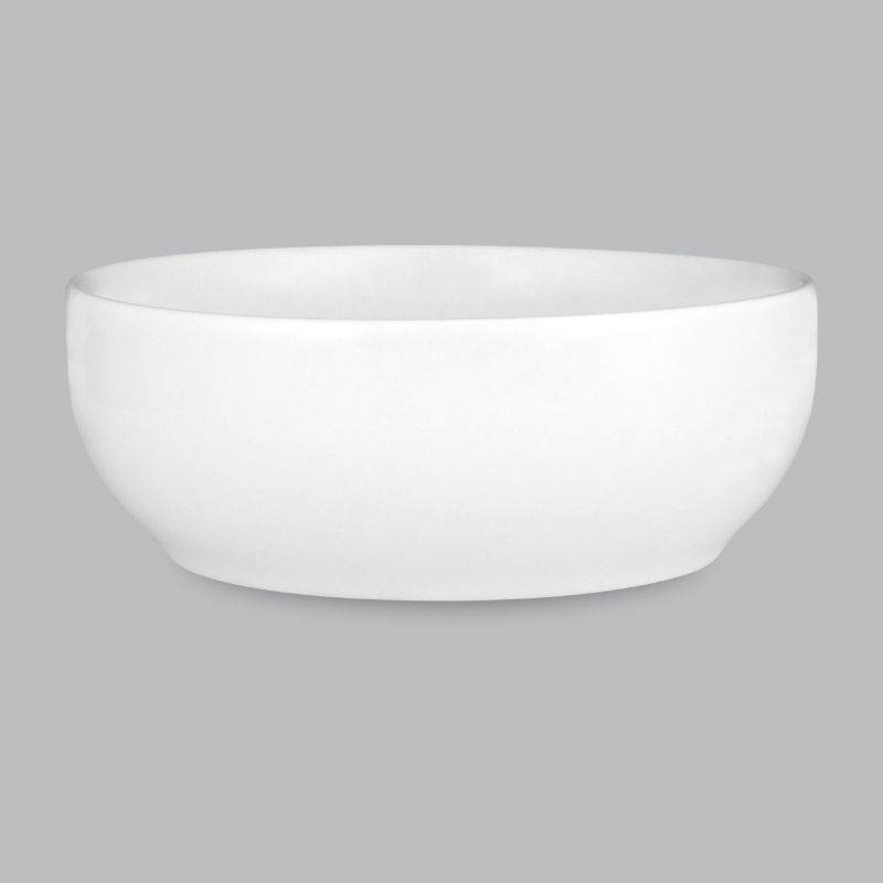 Elegant 11.5cm white nut bowl made from durable new bone porcelain, perfect for serving snacks and desserts.