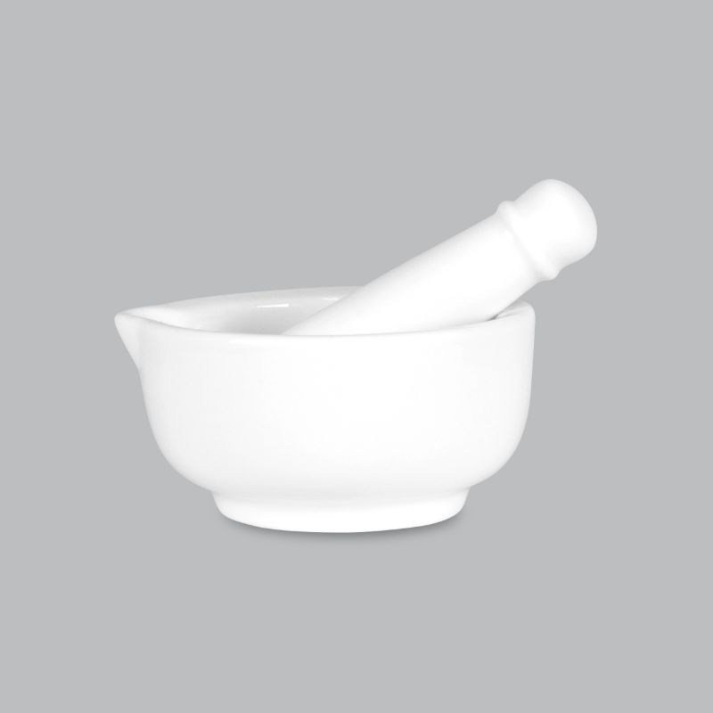 Elegant 7cm mortar and pestle in new bone porcelain, perfect for grinding spices and herbs, dishwasher safe for easy cleanup.