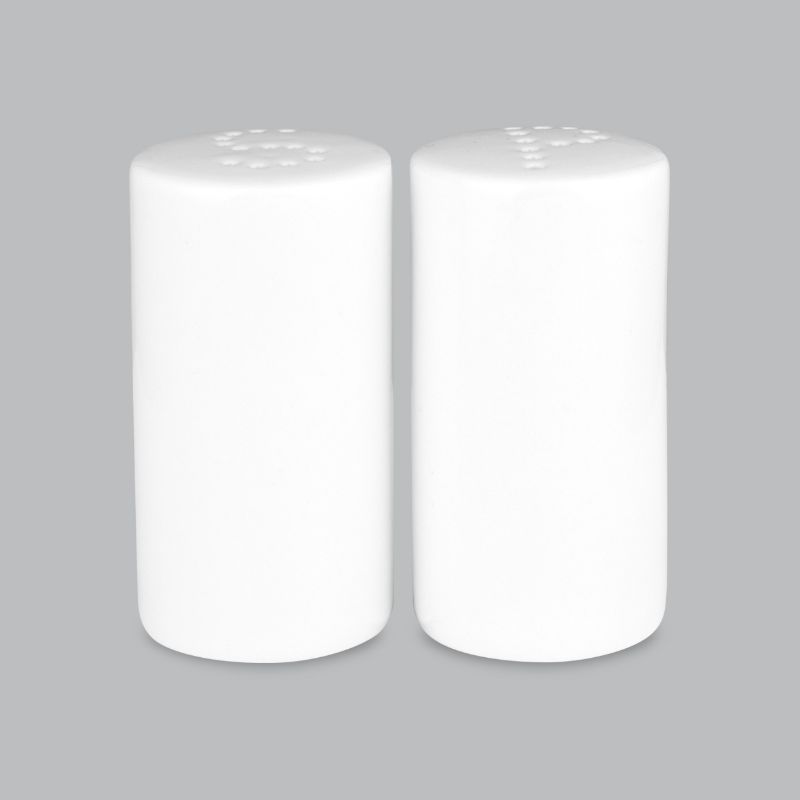 Elegant white salt and pepper set made of durable new bone porcelain, perfect for effortless dining and easy maintenance.