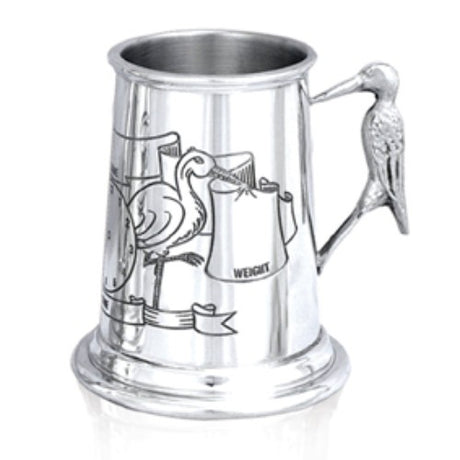 Child's pewter mug featuring a charming stork design, perfect for toddlers' daily use and special occasions.