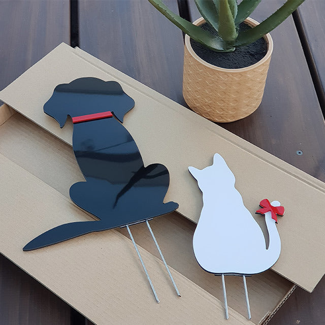 Whimsical garden stakes featuring cat and dog designs, crafted from durable acrylic and ACM, perfect for outdoor decor.