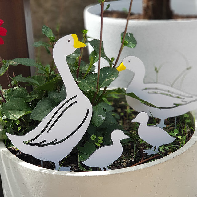 Colorful Duck Family garden stakes featuring a drake, duck, and duckling, ideal for outdoor decoration and gifting.