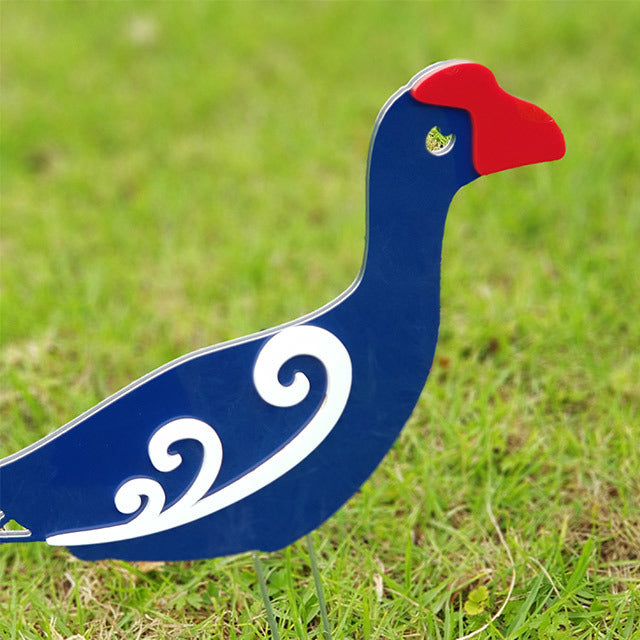 Whimsical Pukeko family garden stakes set, featuring two adults and two chicks in vibrant colors, perfect for outdoor decor.