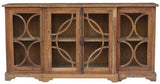 Elegant antique timber sideboard with Art Nouveau curves, four doors, and ample storage for living or dining spaces.