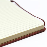 Silvine Executive Notebook A4 in tan, featuring 160 lined pages, inside pocket, and elastic strap for secure note-taking.