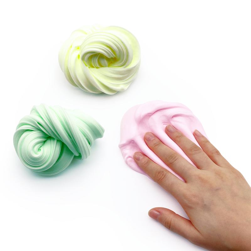 Amos i.Slime DIY kit for making glow-in-the-dark slime, including vibrant glue, activator, and i-Clay for creative fun.