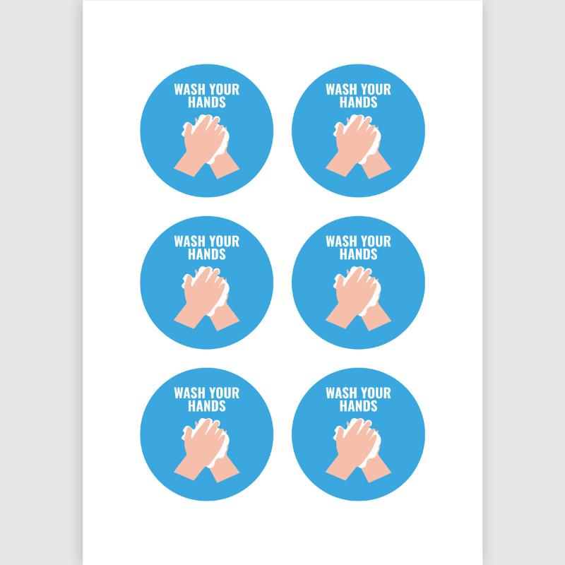 Round self-adhesive 'Wash Your Hands' signs in blue and white on five sheets, promoting hygiene in various settings.