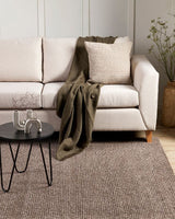 Olive Chester Throw (125x150cm) made of 60% wool and 40% recycled polyester, perfect for cozying up in style.