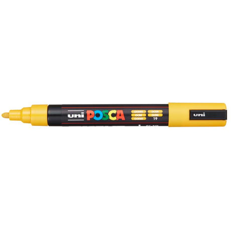 Ochre Uni Posca Marker with medium bullet tip, ideal for artists and crafters on various surfaces with rich color and precision.