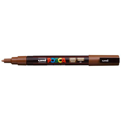 Fine brown Uni Posca marker with a 0.9-1.3mm bullet tip, ideal for detailed artwork on various surfaces.