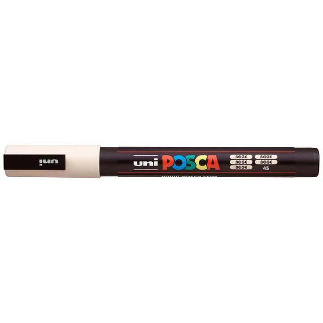 Beige Uni Posca Marker with a fine bullet tip for detailed artwork on diverse surfaces like paper, wood, and fabric.