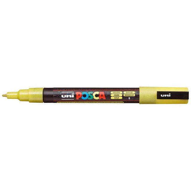 Fine glitter yellow Uni Posca marker with a 0.9-1.3mm tip, ideal for precise designs on various surfaces.