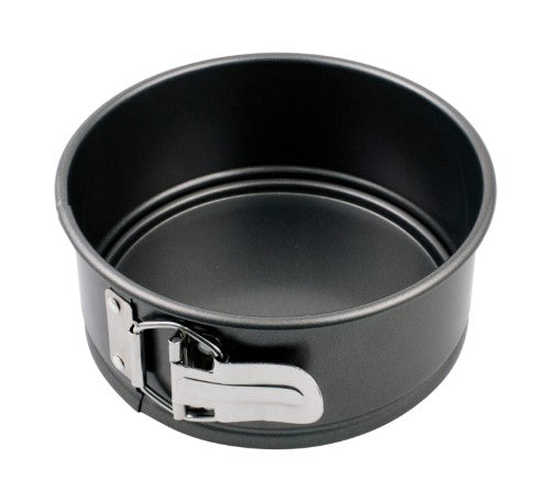 Round 15cm springform cake pan designed for easy release, featuring non-stick coating for cheesecakes and desserts.