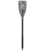 Solar Torch Zapper by Skeeter Hawk emits ambient flickering light while effectively attracting and zapping flying insects outdoors.