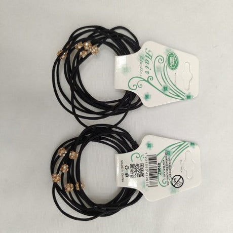 Black hair ties in a pack of 36, offering a secure hold for all hair types; durable and stylish for any occasion.
