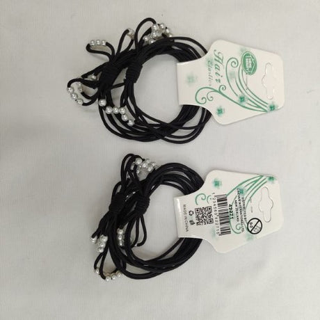 Set of 36 black hair ties providing strong yet gentle hold, ideal for all hair types and styles, perfect for everyday use.