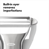 Sleek OXO Steel Y Peeler with stainless steel blade, ergonomic handle, and built-in potato eye remover for effortless peeling.