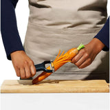 Compact Y-shaped julienne peeler with non-slip handle for precise vegetable strips and garnishes.