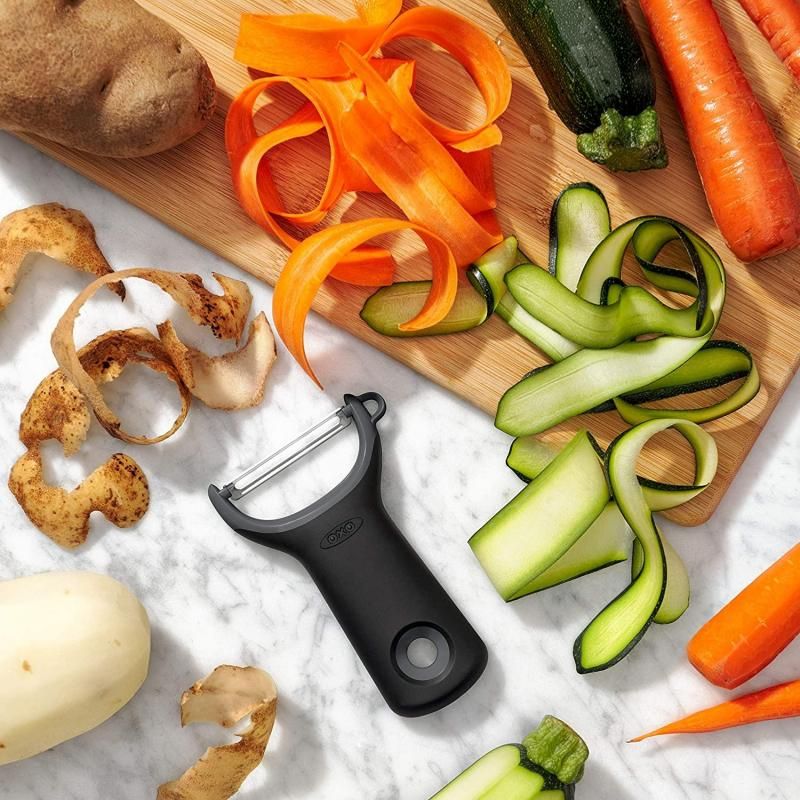 Image of OXO Good Grips Prep Y-Peeler, featuring a non-slip grip and rustproof stainless steel blades for efficient peeling.