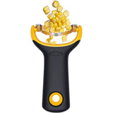 OXO Good Grips Corn Prep Peeler with a non-slip handle and sharp stainless steel blade for easy corn kernel removal.