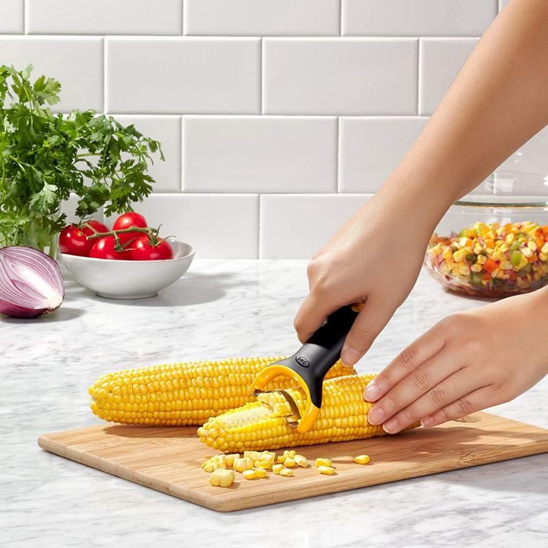 OXO Good Grips Corn Prep Peeler with ergonomic handle and stainless steel blade for easy, efficient corn kernel removal.