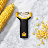 Ergonomic corn peeler with sharp stainless steel blade for effortless kernel removal and easy cleanup.