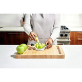 OXO Good Grips Apple Divider with sharp stainless steel blades and cushioned handles for effortless, perfect apple slices.