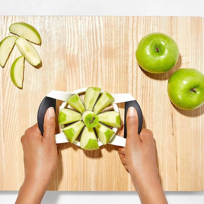 OXO Good Grips Apple Divider with stainless steel blades and cushioned handles for easy, perfect slicing of apples and pears.