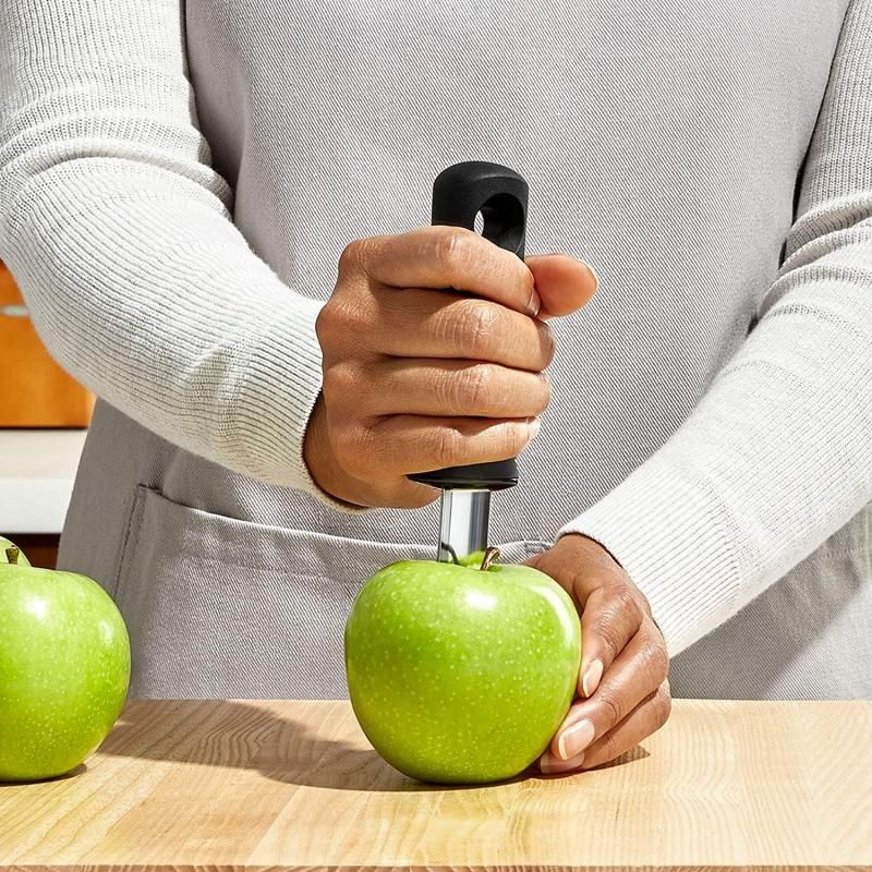 OXO Good Grips Corer with stainless steel head and soft nonslip handle, designed for effortless fruit core removal.